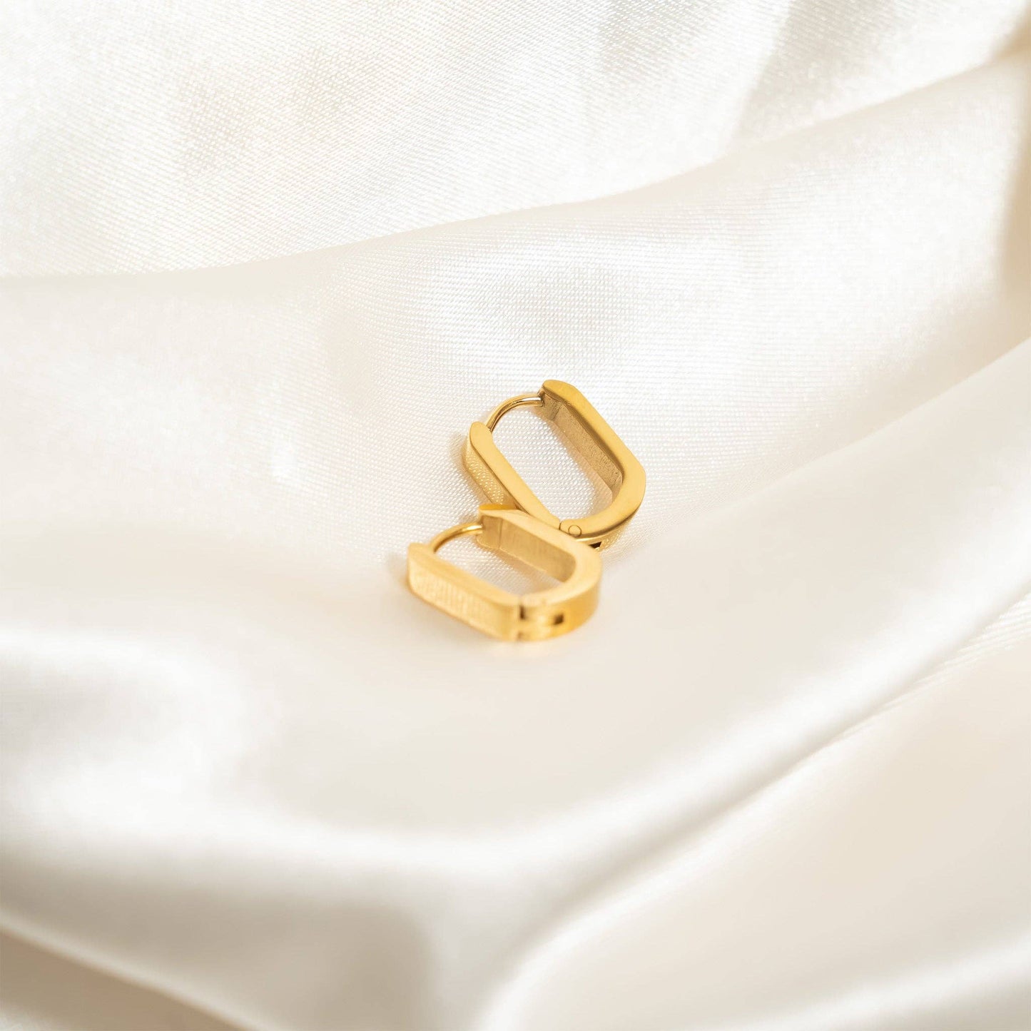 Mini Oval Huggies Earrings